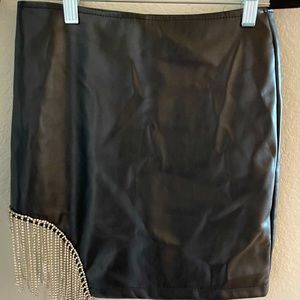 Faux leather mini skirt with rhinestone chain